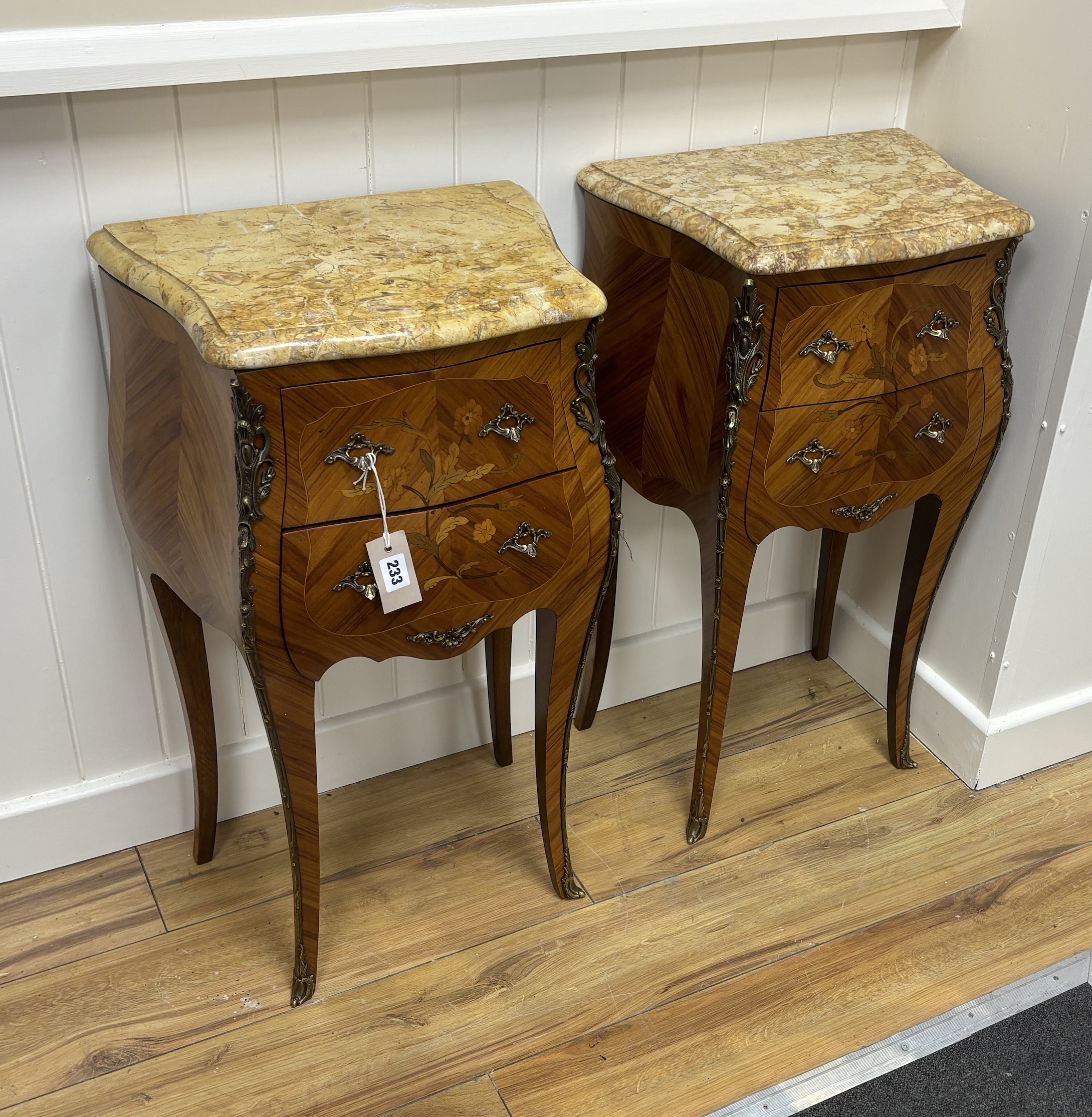 A pair of Louis XV style gilt metal mounted inlaid kingwood marble top bombe bedside chests, width 42cm, depth 30cm, height 72cm